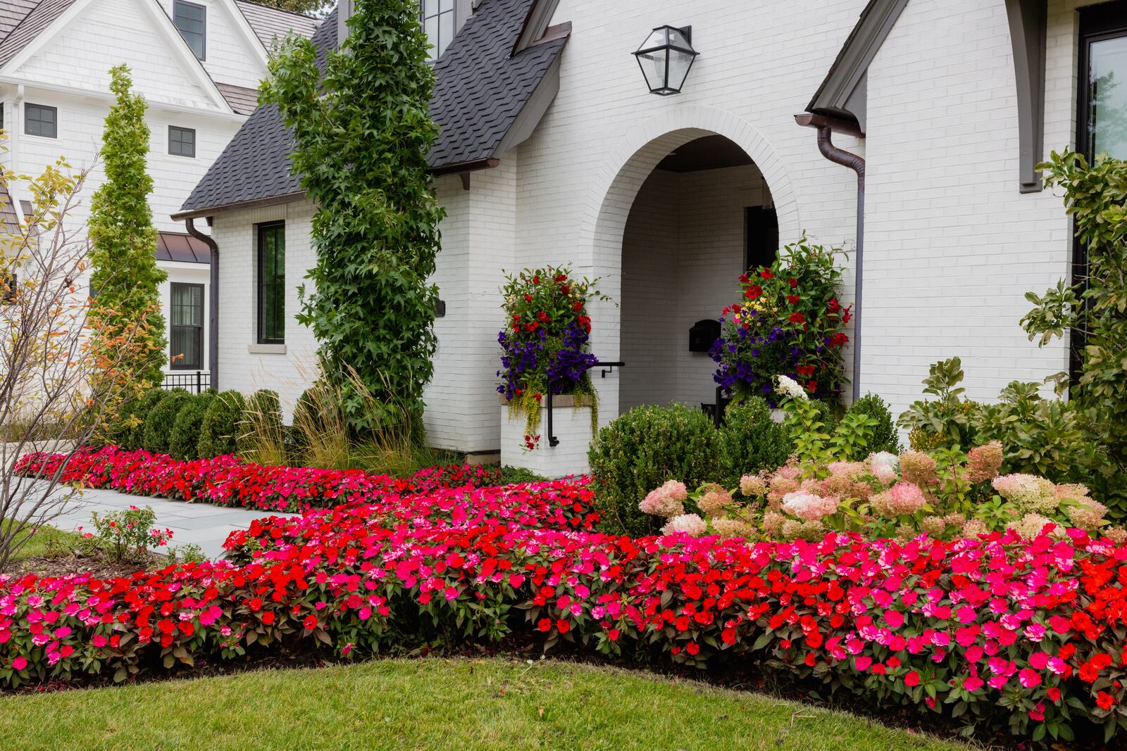 Seasonal container and color rotations — Bertog Landscape, Chicago's North Shore
